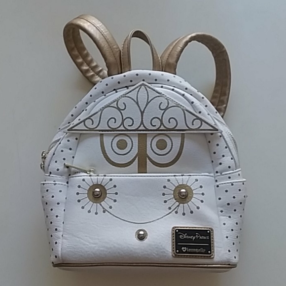 Loungefly Handbags - Disney parks loungefly small world backpack